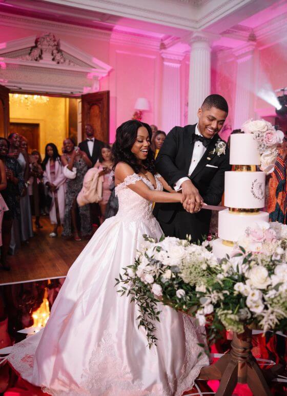 Cutting the wedding cake at Hedsor House
