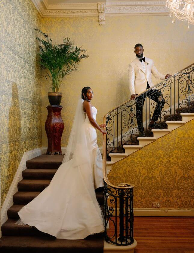 Couple on staircase at Hedsor House