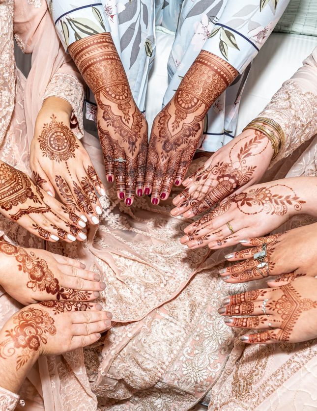 mehndi (henna) on the wedding guests hands